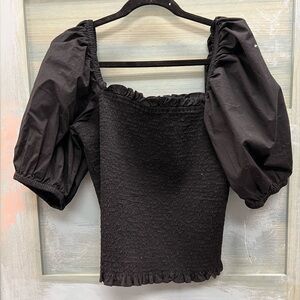 INC black shirt